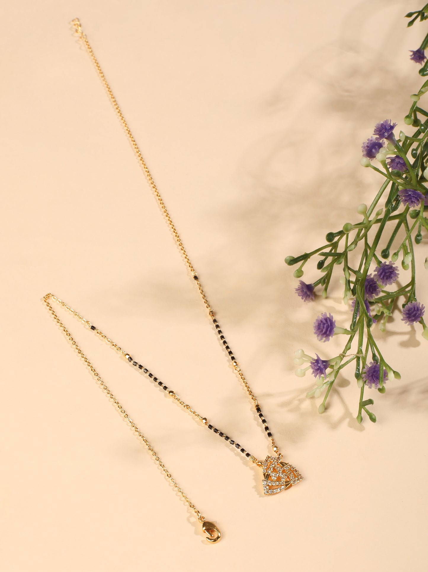 Trinity Heart Mangalsutra – Interlocked CZ Hearts in Modern Gold Finish