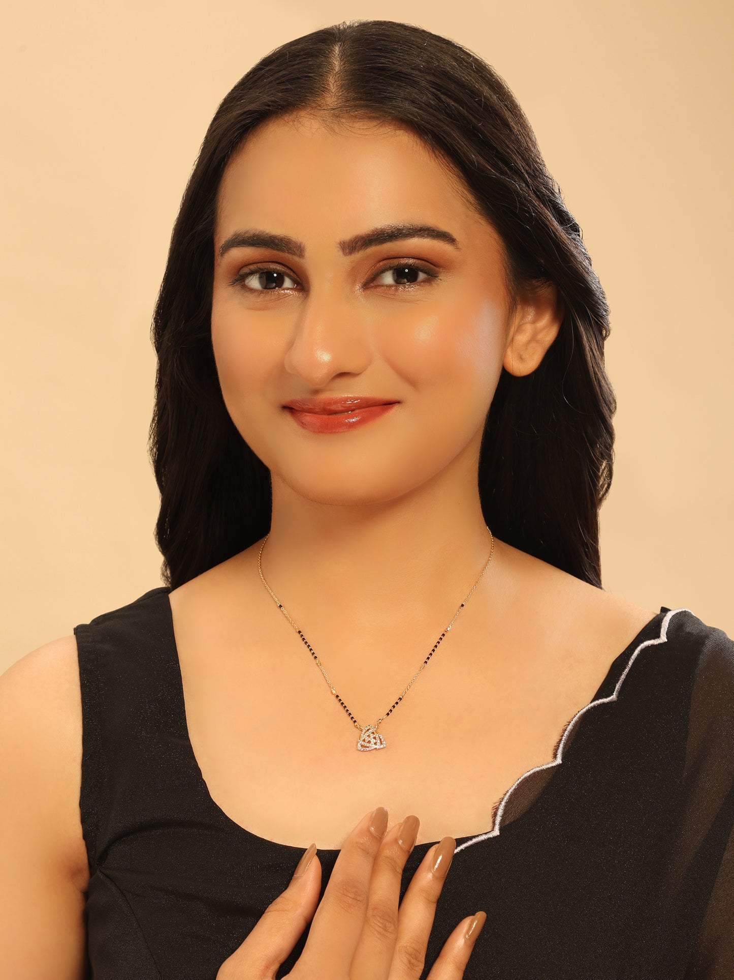 Trinity Heart Mangalsutra – Interlocked CZ Hearts in Modern Gold Finish